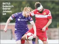  ?? ?? BATTLE: Guiseley’s Gabriel Johnson, left