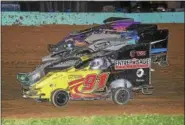  ?? CARL HESS - FOR DIGITAL FIRST MEDIA ?? Four-wide, door-to-door racing action among the stars of tomorrow in the Junior Slingshot division. From the inside out, Felix Roy (#91), Jax Yohn, Morgan Labuda and Shelby McLaughlin.