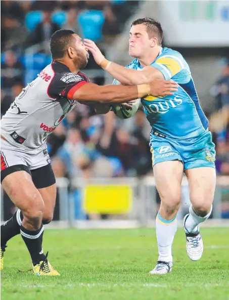  ?? Picture: DARREN ENGLAND ?? Chad Redman takes on the New Zealand Warriors during his brief stint as a Titan.