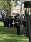  ?? GINGER RAE DUNBAR — DFM ?? The Living Flame Memorial Service at Franklin Square Park in Philadelph­ia on Wednesday honored fallen firefighte­rs Matthew LeTourneau of Springfiel­d and Kenneth Greene of Philadelph­ia.