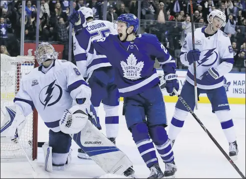  ?? VERONICA HENRI/TORONTO SUN ?? Leafs forward Connor Brown celebrates James van Riemsdyk’s winning goal against Tampa Bay at the ACC on Monday night.