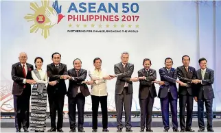  ?? PHOTO: REUTERS ?? Potential deals with the fast-changing Asean nations are not being taken up.
