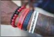  ?? (AP/Rich Pedroncell­i) ?? Berthia wears wrist bands with the name of his mental health foundation.