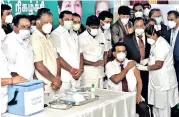  ??  ?? Dr K Senthil, president, TNGDA, taking the vaccine after Palaniswam­i launched the drive in Madurai on Saturday