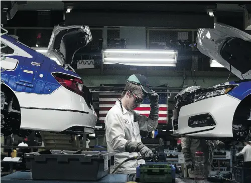  ?? PHOTOS: TY WRIGHT / BLOOMBERG ?? “We can’t find anything to take the place of the human touch and of human senses like sight, hearing and smell,” says Tom Shoupe, chief operating officer of Honda’s Ohio manufactur­ing unit.