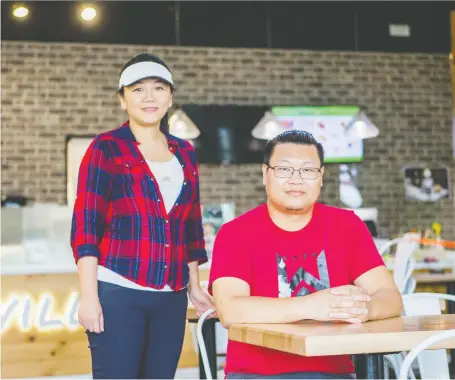  ?? MATT SMITH ?? Sherry Chen, left, and Benny Su have created the Web-based business FOODEX, an online ordering system that allows restaurant­s to easily and directly accept online orders without listing on aggregator platforms.