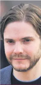  ?? Picture: AFP ?? IN HIS SHOES. Daniel Bruhl plays the young fashion designer.