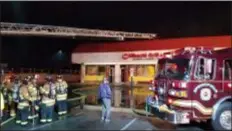  ?? SUBMITTED PHOTO ?? Firefighte­rs battle a blaze at a restaurant in Stoney Creek Shopping Center on Baltimore Pike in Springfiel­d Monday night. No injuries were reported.