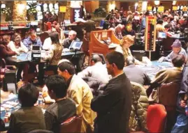  ?? PETER BATTISTONI/PNG ?? Packed poker tables at River Rock casino, B.C.’s largest gambling venue.