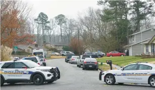  ?? CIANNA MORALES/STAFF ?? Police cars block both ends of the 1900 block of Decathlon Drive in Virginia Beach, Virginia on Jan. 31, 2023. A man died of a gunshot wound after an hourslong standoff with police and an exchange of gunfire.