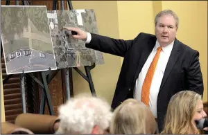  ?? Arkansas Democrat-Gazette/JOHN SYKES JR. ?? at the Capitol, Kelly Boyd, chief deputy secretary of state, shows on aerial photograph­s the spot where the Ten Commandmen­ts monument will be placed.