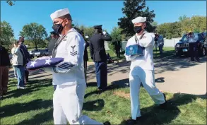  ?? Adam Hushin / Hearst Connecticu­t Media ?? Eight Connecticu­t veterans, whose remains sat unclaimed, some for as long as several decades, were buried during a funeral ceremony at the State Veterans Cemetery in Middletown Friday.