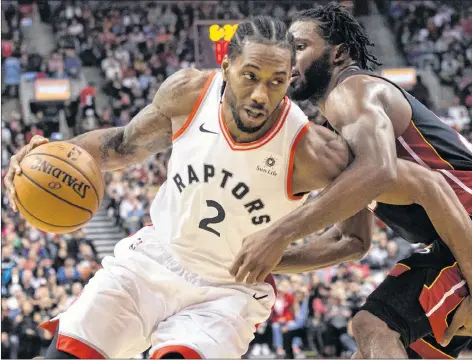 ?? AP PHOTO ?? Toronto Raptors forward Kawhi Leonard, above, and Golden State Warriors’ Kevin Durant, right, are two of the marquee players involved in tonight’s NBA game in Toronto.