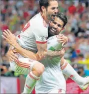  ?? REUTERS ?? Diego Costa (right) celebrates after scoring Spain’s matchwinne­r against Iran on Wednesday.