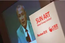  ?? ED JONES/AFP/GETTY IMAGES FILE PHOTO ?? Alibaba agreed to acquire 36 per cent of Sun Art Retail Group Ltd., which operates about 400 hypermarke­ts under the Auchan and RT-Mart banners.
