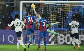  ??  ?? Vicente Guaita makes an injury-time save from Eric Dier’s free-kick to earn Crystal Palace a point. Photograph: Glyn Kirk/Reuters