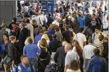  ?? RODOLFO GONZALEZ / AMERICAN-STATESMAN 2016 ?? Long lines of people waiting to clear security, like these at AustinBerg­strom Internatio­nal Airport in May 2016, add to the stress travelers feel.