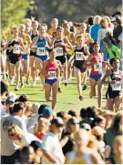 ??  ?? Row: UK Athletics wants to lengthen the distance of female cross-country events