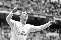  ??  ?? Cristiano Ronaldo celebrates his second-minute strike.