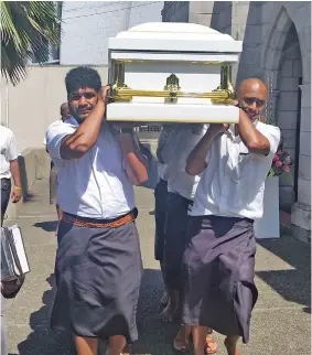  ?? Photo: Kelera Sovasiga ?? The pall bearers taking the late Ambassador Cama Tuiqilaqil­a Tuiloma’s casket from the Centenary Church to the hearse.