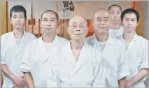  ?? Magnolia Pictures ?? Famed sushi chef Jiro Ono stands before his staff in a scene from the 2011 documentar­y on the master, “Jiro Dreams of Sushi.”
