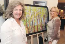  ??  ?? This painting by Sara Lipnowski, left, was bought by Karin Bercovitch at a fundraiser in support of the upcoming Eric Walk for Cancer Care.