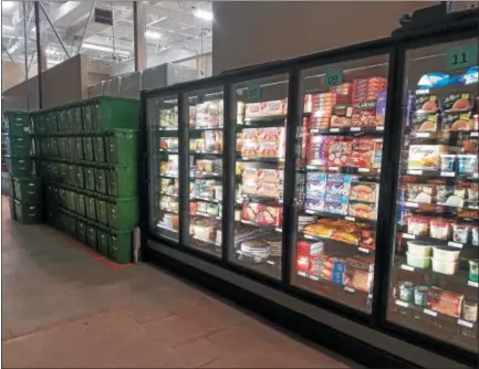  ?? PHOTOS BY DONNA ROVINS — DIGITAL FIRST MEDIA ?? Frozen grocery items are ready to be packed for customer delivery at online grocer Peapod’s newest wareroom. The new facility is located at the North Coventry Giant on Glocker Way, and is a partnershi­p with Giant Food Stores.