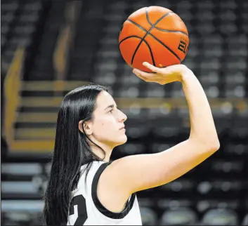  ?? Charlie Neibergall The Associated Press ?? Iowa guard Caitlin Clark was named the top female amateur athlete in the country last season after her dominating season on the court.