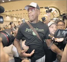  ?? Mark Schiefelbe­in Associated Press ?? DENNIS RODMAN, shown in Beijing last June, pleaded guilty to two drunkdrivi­ng charges. He was ordered to complete an alcohol program and fined $390.