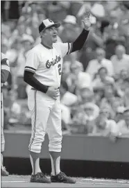  ?? GENE SWEENEY JR./THE BALTIMORE SUN VIA AP ?? In this undated photo, Baltimore Orioles manager Joe Altobelli waves during introducti­ons before a baseball game in Baltimore. Altobelli, the manager who led the Orioles to their most recent World Series title in 1983, has died at the age of 88. The Orioles confirmed Altobelli’s death on Wednesday and in a statement said that the manager was a “tremendous leader.”