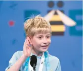  ?? ALEX BRANDON/AP ?? Miles Hubbert, 10, of Centrevill­e, Maryland, listens for a word Tuesday at the Scripps National Spelling Bee. Spellers face a new preliminar­y round format.