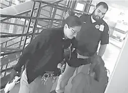  ?? SOURCE: BERNALILLO COUNTY ?? A Metropolit­an Detention Center jail officer appears to grab inmate Susie Chavez’s hair in video of the September 2015 incident.