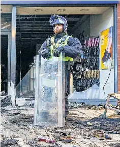 Shop staff ‘fearing for their safety’ after rioters loot stores ...