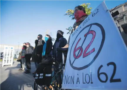  ?? CHRISTINNE MUSCHI ?? “We think (Bill 62) is inhibiting people from practising the freedoms they have as Canadians,” a protester told the Gazette.