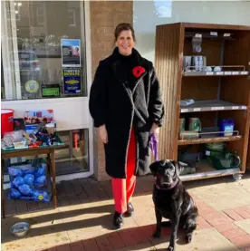  ?? ?? COLLECTING: Kim Murray and Molly collecting for the Poppy Appeal