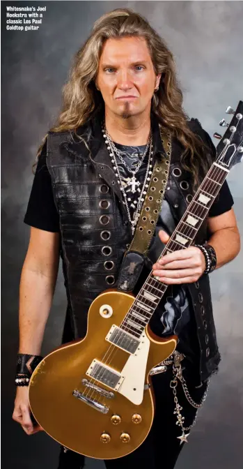  ??  ?? Whitesnake’s Joel Hoekstra with a classic Les Paul Goldtop guitar