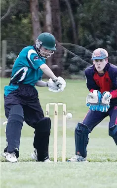  ??  ?? Yarragon’s Laytten Smith plays an expansive drive in division one, watched on by Buln Buln wicket-keeper Jack Armour; Photograph: Lauren Murphy.