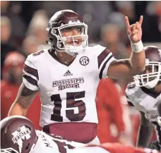  ?? NELSON CHENAULT, USA TODAY SPORTS ?? Dak Prescott was a three-year starter at Mississipp­i State and led the Bulldogs to the No. 1 ranking for several weeks in 2014.