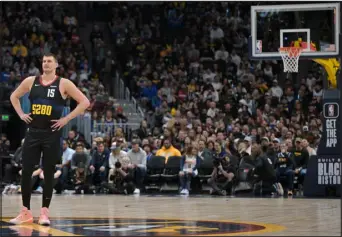  ?? RJ SANGOSTI — THE DENVER POST ?? Nuggets center Nikola Jokic gets ready to take on the Miami Heat at Ball Arena in Denver on Thursday.