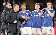  ?? ?? PRESSURE: Rodgers gives advice to his players