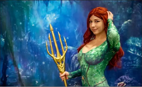  ?? PROVIDED BY FAN EXPO HQ ?? A Fan Expo cosplayer dressed as Mira from the 2018 movie “Aquaman” poses at one of the convention’s photo areas. The company’s Denver event returns this weekend.