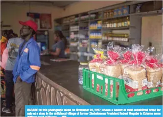  ??  ?? HARARE: In this photograph taken on November 23, 2017, shows a basket of state subsidized bread for sale at a shop in the childhood village of former Zimbabwean President Robert Mugabe in Kutama some 200kms west of Harare. —AFP