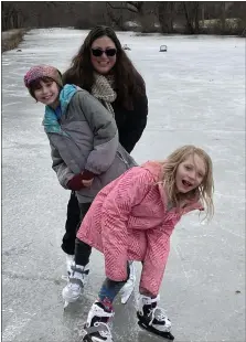  ?? LAURA GEIGER/SUBMITTED PHOTO ?? Laura Geiger and her daughters ice skating on the frozen Schuylkill Canal in Phoenixvil­le.