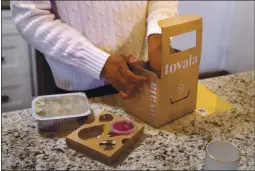  ??  ?? Tovala’s pre-assembled meals contain a QR code that customers scan into a special smart oven, which automatica­lly adjusts its settings.