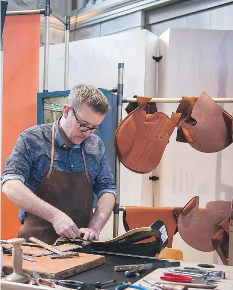  ??  ?? The Hermès at Work exhibition, beginning Wednesday in Vancouver, provides visitors with a look at some of the French fashion house’s artisans at work. They’ll apply their expert craftsmans­hip to tasks such as gem setting, watchmakin­g, glove creation,...