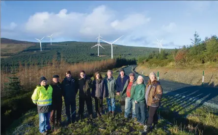  ??  ?? Members of the Croghan Cluster at Raheenleag­h Wind Farm to officially open the Raheenleag­h Wind Farm amenity walks.