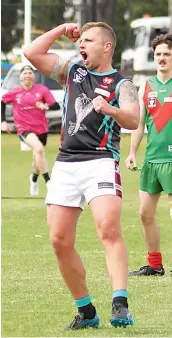  ?? ?? Cora Lynn’s Lachlan Cove is pumped up after nailing a goal in the reserves.