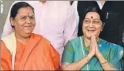  ??  ?? External affairs minister Sushma Swaraj with water resources minister Uma Bharti outside Parliament on Wednesday. Swaraj made it to the session for the first time since her surgery in 2016.