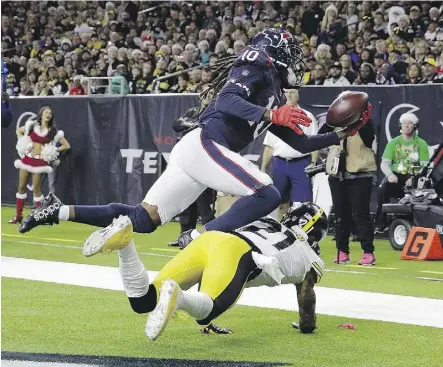  ??  ?? Houston Texans wide receiver DeAndre Hopkins made an impressive touchdown catch over Pittsburgh cornerback Joe Haden Monday, but that was the only highlight for the home team in a 34-6 rout by the visiting Steelers.