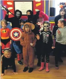  ??  ?? Clockwise from above: Pirnmill primary pupils from P1 to P7 celebrated Hallowe’en with a dress-up day; Teachers at Arran High School set a perfect example with their Hallowe’en costumes; Whiting Bay primary pupils enjoy some afternoon sunshine at their dress up day; A ghoulish gathering of P1 to P4 pupils at Kilmory primary; A motley crew of older pupils at Whiting Bay primary.